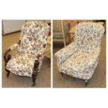 A Victorian Armchair, circa 1870, with floral loose cover and raised on simulated rosewood turned