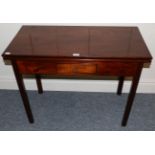 A George III Mahogany Foldover Tea Table, early 19th century, of rectangular form with small