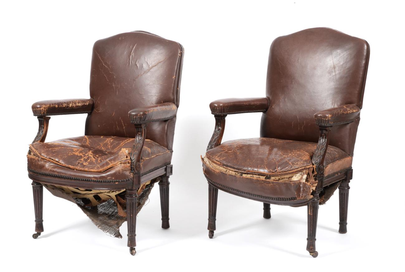 A Pair of 19th Century Carved Mahogany Library Armchairs, in the manner of Gillows, recovered in