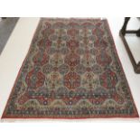 Ghom Rug Central Iran, circa 1950 The polychrome compartmentalised field enclosed by reciprocal