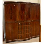 A Mahogany, Boxwood and Ebony Strung Bowfront Wardrobe, early 20th century, with two cupboard