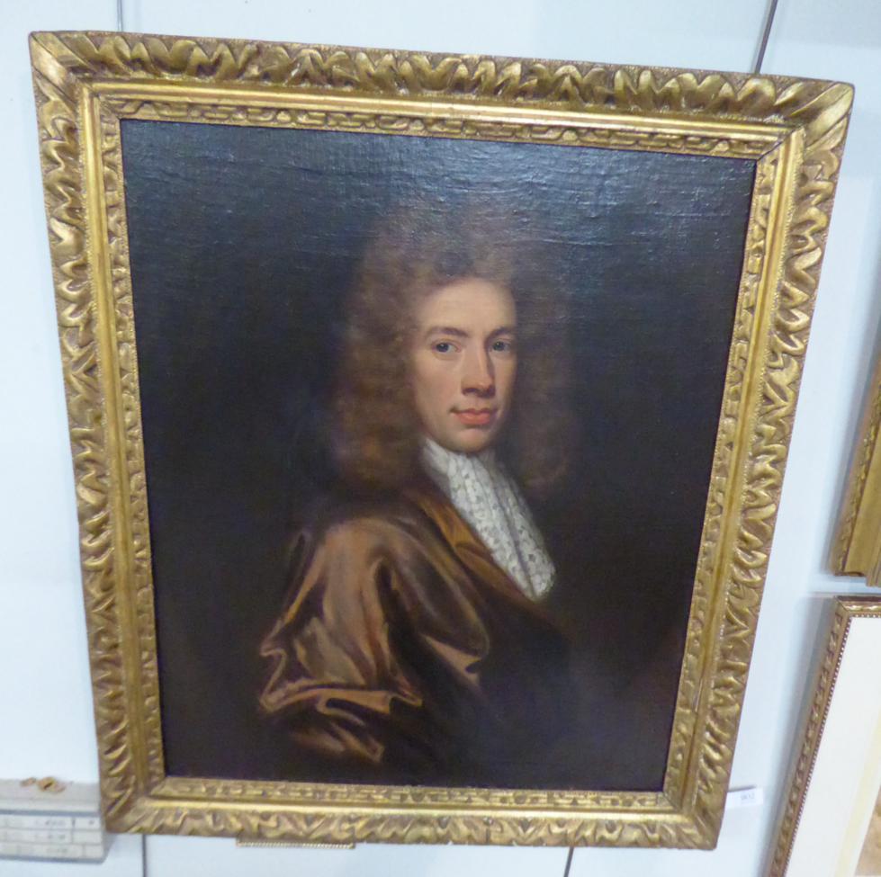 Follower of Sir Godfrey Kneller (1646-1723) Portrait of a gentleman, head and shoulders, wearing a - Image 2 of 4