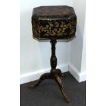 A Regency Japanned Teapoy or Sewing Casket on Stand, early 19th century, foliate painted with hinged