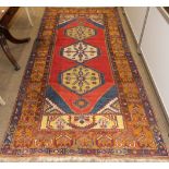 Konya Rug Central West Anatolia, circa 1960 The madder lozenge field with three hexagons enclosed by