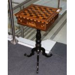 An Early 19th Century Rosewood and Marquetry Decorated Chess Top Tripod Table, the hinged lid raised