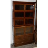 An Edwardian Mahogany and Satinwood Banded Five Piece Sectional Bookcase, the upper section with six