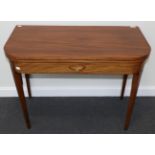 A George III Mahogany and Boxwood Strung Foldover Tea Table, late 18th century, of rounded