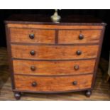 A George IV Mahogany Bowfront Chest of Drawers, 2nd quarter 19th century, of two short over three