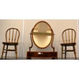 A Late George III Mahogany Dressing Table Mirror, early 19th century, the oval plate above a