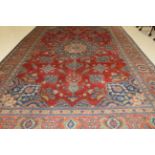 Tabriz Carpet Iranian Azerbaijan, circa 1930 the blood red field of stylised flowerheads centred