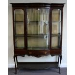 An Edwardian Mahogany and Barber's Pole Strung Display Cabinet, with central glazed door enclosing a