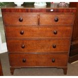 A George III Oak and Mahogany Crossbanded Straight Front Chest, early 19th century, of two short