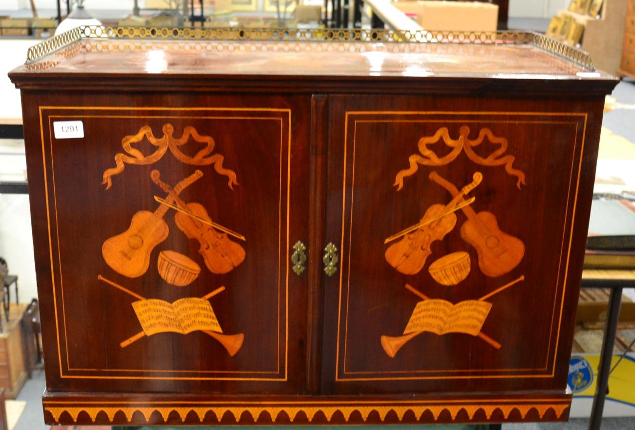 A Victorian Mahogany and Marquetry Inlaid Music Cabinet, 3rd quarter 19th century, foliate inlaid