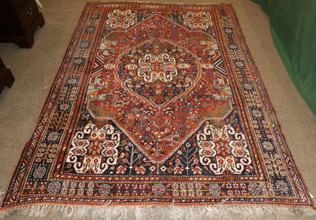 Kashgai Rug South West Iran, circa 1920 The madder field of stylised plants around a cusped