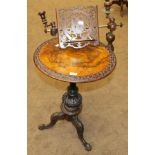 A Victorian Burr Walnut Circular Tripod Table/Music Stand, circa 1870, the carved top with