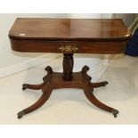 A Regency Mahogany and Brass Inlaid Tea Table, early 19th century, with hinged leave above a