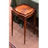 A George III Style Mahogany, Ebony and Tulipwood Banded Urn Stand, with shaped gallery above a