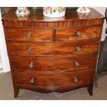 A Regency Mahogany and Ebony Strung Bowfront Chest of Drawers, early 19th century, of two short over