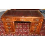 A Late 19th Century Mahogany and Pine Lined Double Pedestal Desk, with inset red and gilt leather