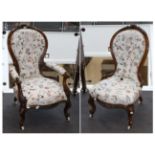 A Victorian Walnut Framed Open Armchair, circa 1870, recovered in cream and floral fabric with