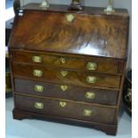 A George III Mahogany and Crossbanded Bureau, 3rd quarter 18th century, brass solid backplate