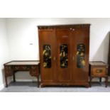 An Early 20th Century Mahogany and Chinoiserie Three Piece Bedroom Suite, comprising a triple door