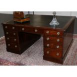 A Victorian Mahogany Double Pedestal Partners' Desk, 3rd quarter 19th century, with inset black