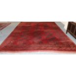Turkmen Carpet North West Anatolia, 1910 The claret field with three rows of elephant foot guls