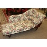 A Victorian Mahogany Framed Chaise Longue, circa 1870, with loose cover and later recovered in red