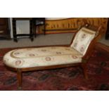 A Regency Mahogany and Gilt Metal Mounted Day Bed, early 19th century, recovered in silk damask, the