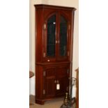 A Late George III Mahogany and Boxwood Strung Free-Standing Corner Cupboard, the upper section