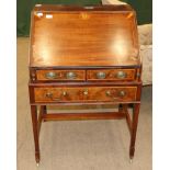 A George III Mahogany and Marquetry Inlaid Bureau on Stand, late 18th century, the fall enclosing