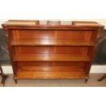 A Victorian Mahogany Free-Standing Dwarf Bookcase, mid 19th century, with two adjustable shelves all