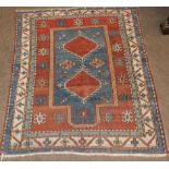 Kazak Prayer Rug Central Caucasus, 20th century The indigo field with two hexagons beneath the