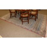 Ghom Carpet Central Iran, circa 1940 The ivory field of boteh enclosed by floral borders, 310cm by