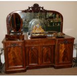 A Victorian Mahogany Inverted Breakfront Mirror-Back Sideboard, mid 19th century, with arched mirror