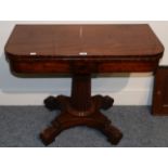 A Victorian Mahogany Foldover Card Table, circa 1870, of rounded rectangular form, raised on a