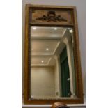 A Late 19th Century Gilt and Gesso Wall Mirror, with a rectangular bevelled glass plate below a