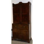 A Regency Mahogany and Pine Sided Secretaire Bookcase, early 19th century, the upper section with