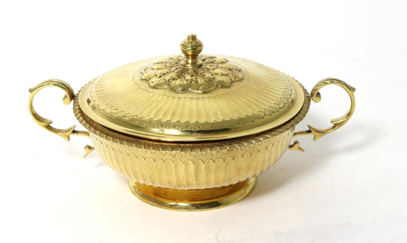 A Silver Gilt Twin Handled Porringer and Cover, S Blanckensee & Son, Chester 1936, fluted and with