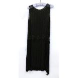 Circa 1920s Sheer Black Tabard Style Drop Waist Dress, decorated with beadsHoles and chiffon missing