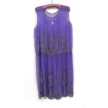 Circa 1920s Purple Silk Chiffon Drop Waist Dress, decorated with metallic silver beads and bugle