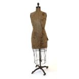 Circa 1940s J F Bauman, New York Adjustable Mannequin with Wire Cage Skirt, with a brown card torso,