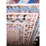 Mid 19th Century Patchwork Quilt, worked in frames with a central square, patched with pink and
