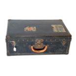 An Early 20th Century Louis Vuitton Suitcase, mounted with black canvas and black painted trim,
