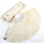 An Early 20th Century Brussels Point de Gaze Needlelace Fan, on gilded mother of pearl sticks and