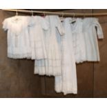 Six Victorian and Later White Cotton Baby Gowns, including two hand worked cotton pique boys gowns