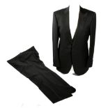 A Rare Brioni for James Bond Black Dinner Jacket and Trousers, with silvered lining woven with