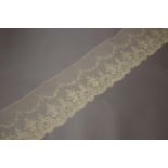 Two 19th Century Brussels Lace Applique Flounces, worked on machine net, decorated with swags of