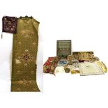 Assorted Embroidery and Haberdashery, including an ecclesiastical panel, worked on green silk